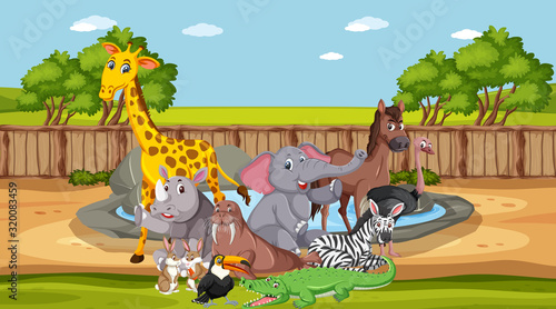 Scene with wild animals in the zoo at day time