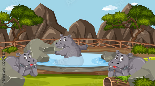 Scene with wild animals in the zoo at day time