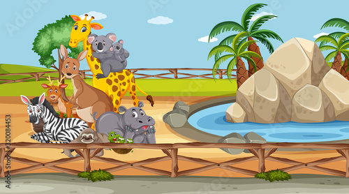 Scene with wild animals in the zoo at day time