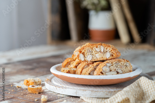 Tableau sur toile Carquinyolis, biscottis a typical pastry of Catalonia, Spain on rustic background with copy space