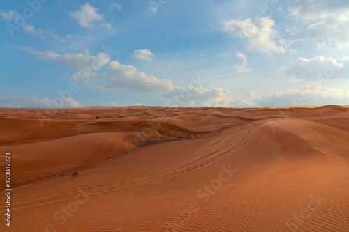 Sand desert landscape view with blue sky  UAE