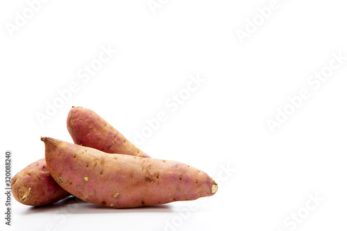 japanese sweet potatoes on white background