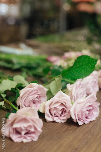 bouquet of roses in front of spring scene © smishura