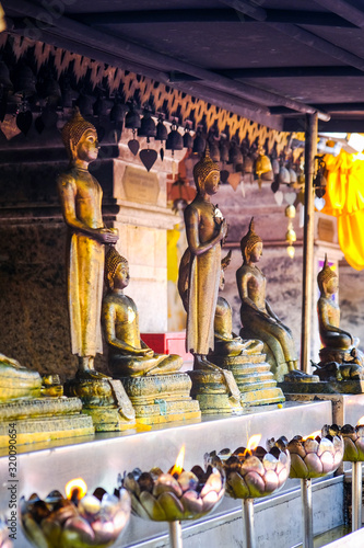 Ornate buddhist statues at a Buddhist temple in Bangkok, Thailand