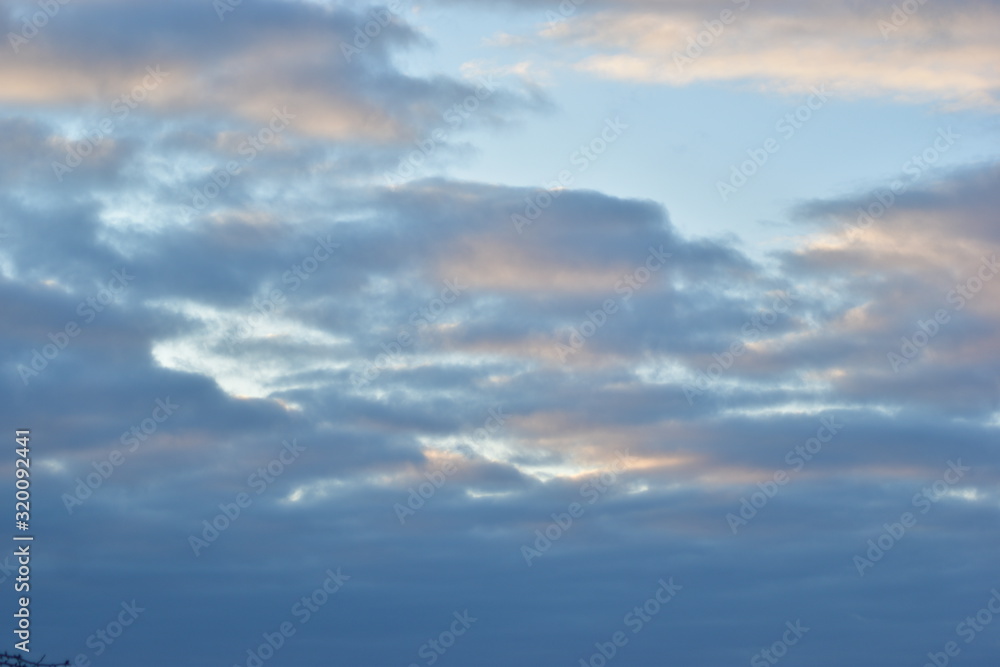 winter cloudy sky at sunset
