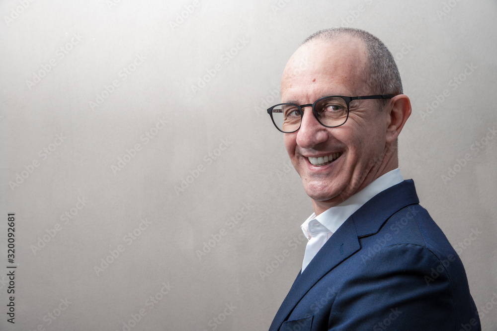 smiling businessman with reliable look smiling businessman with reliable look