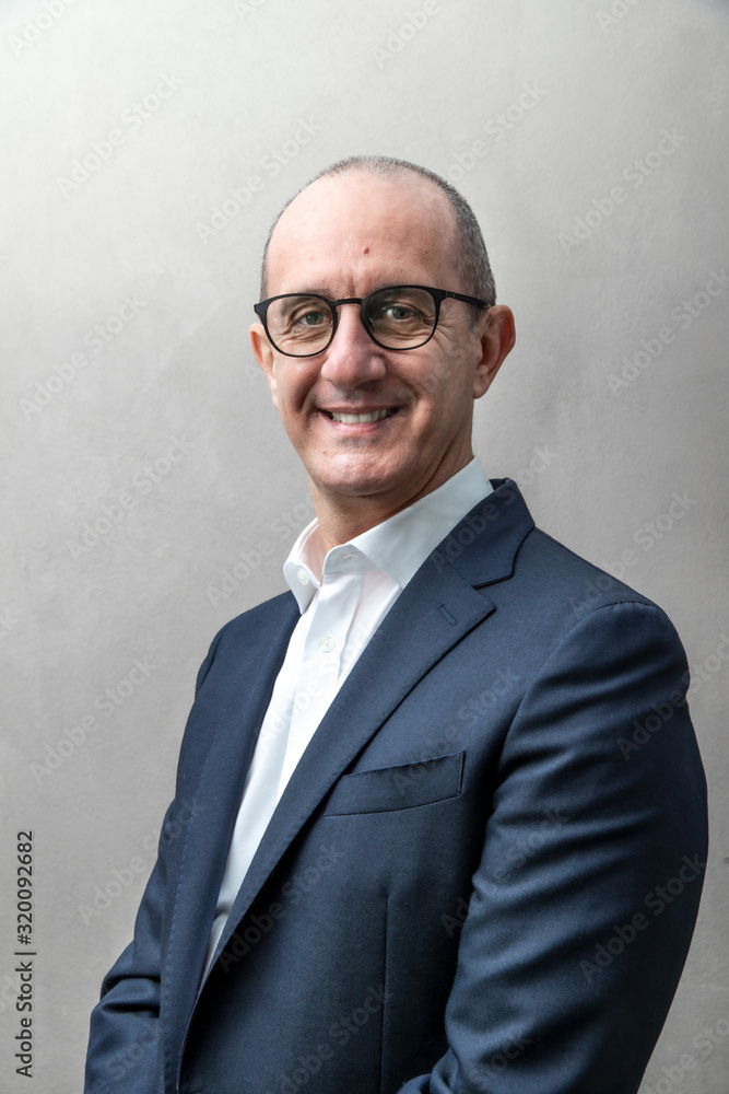 smiling businessman with reliable look smiling businessman with reliable look