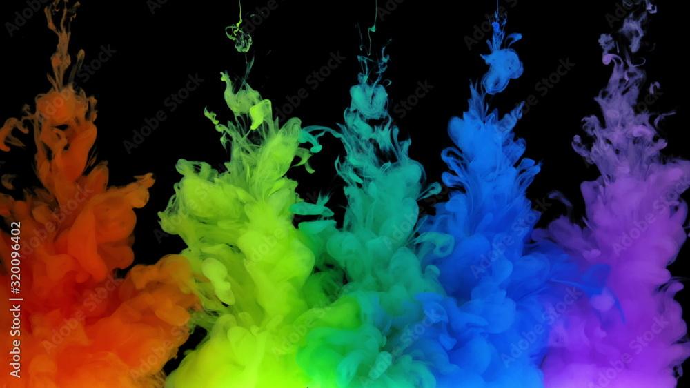 Multicolored composition from ink streams. ink streams from the rainbow spectrum float and mix in the center of the composition. Colorful abstract combination of acrylic rainbow colored black bg