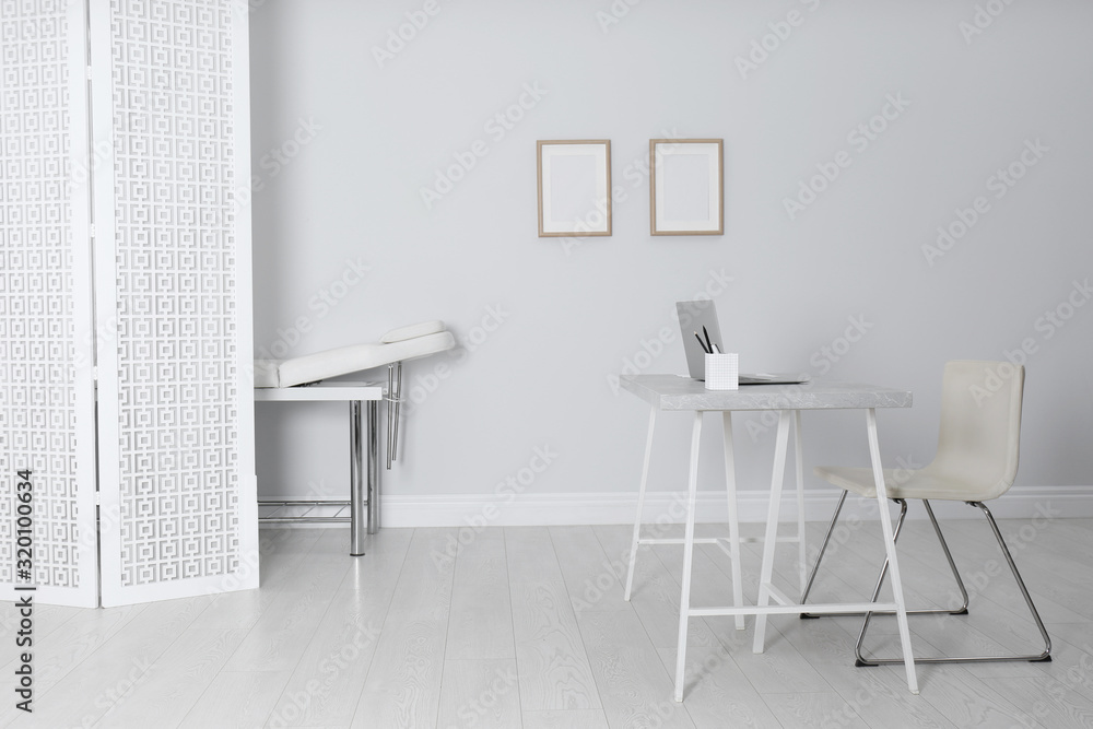 Doctor's office interior with modern workplace in clinic Stock Photo