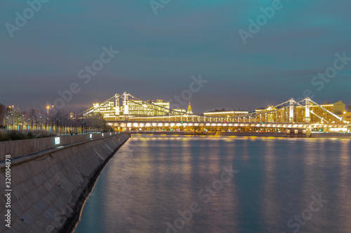 Glowing bridge over the river. The far plan. Moscow night © JoyNik