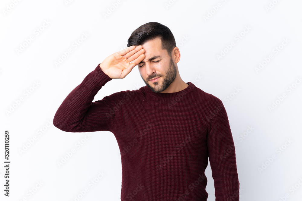 Young handsome man with beard over isolated white background with tired and sick expression Young handsome man with beard over isolated white background with tired and sick expression