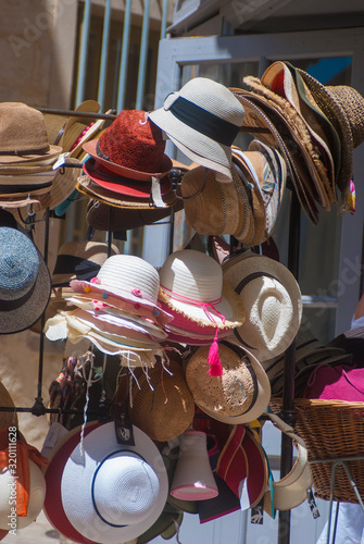 colourful hat stand and street in Uzes