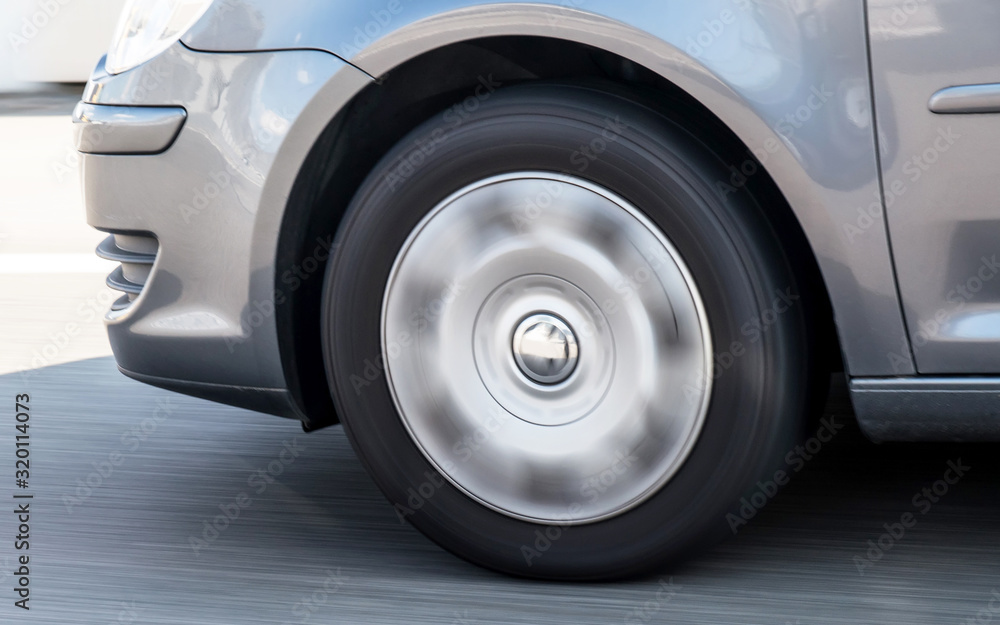 Car tire in the road in Switzerland. Blur in motion