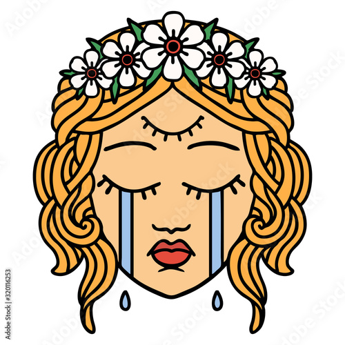 traditional tattoo of female face crying with third eye
