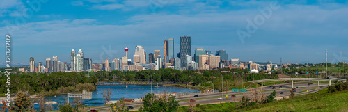 Panorama of Calgary's skyline along the Deerfoot Trail freeway.