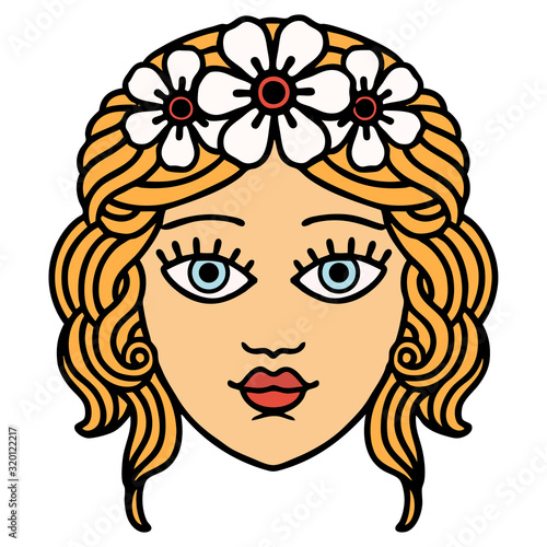 traditional tattoo of female face with crown of flowers
