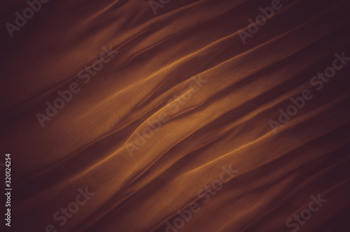Red-orange waves abstract from silk fabric © Евгений Дорганев