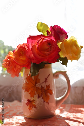 Wallpaper Mural Beautiful multi-colored garden roses in a vase by the window Torontodigital.ca