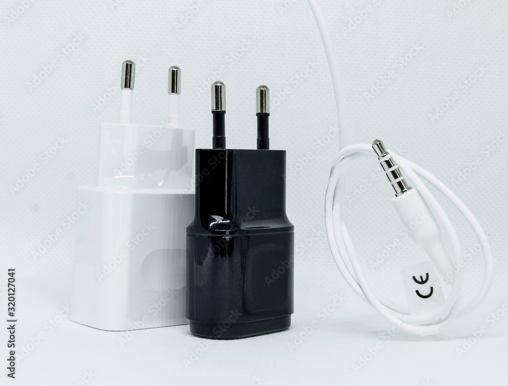 white cords and headphones on a white background , white cords and headphones on a white background ,