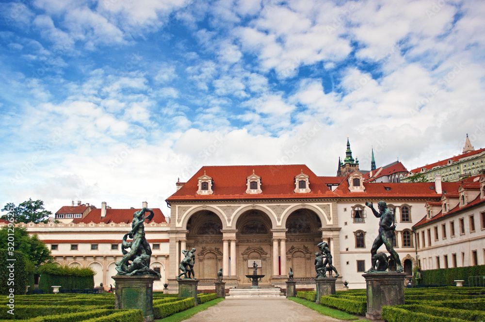 View of empty entrance to Wallenstein Palace, its statues and garden View of empty entrance to Wallenstein Palace, its statues and garden