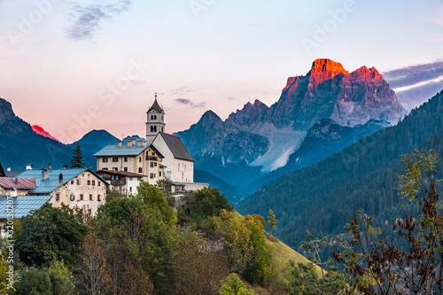 Wallpaper Mural Ancient church dedicated to Saint Lucy in Colle Santa Lucia, with a breathtaking view over the Pelmo mountain, Dolomites (IT) Torontodigital.ca