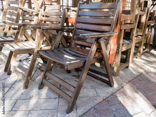 Wooden chairs in the city