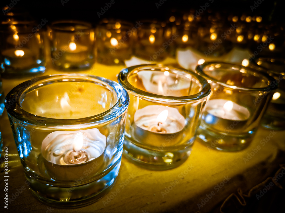 Candles in small little glasses during the vigil ceremony and prayer. Candles in small little glasses during the vigil ceremony and prayer.