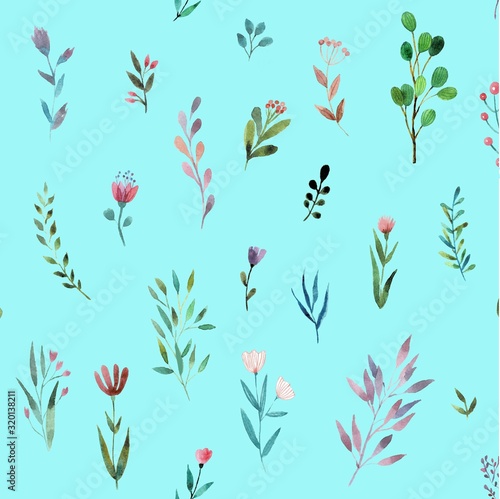 A seamless pattern with small flowers and plants on a blue background
