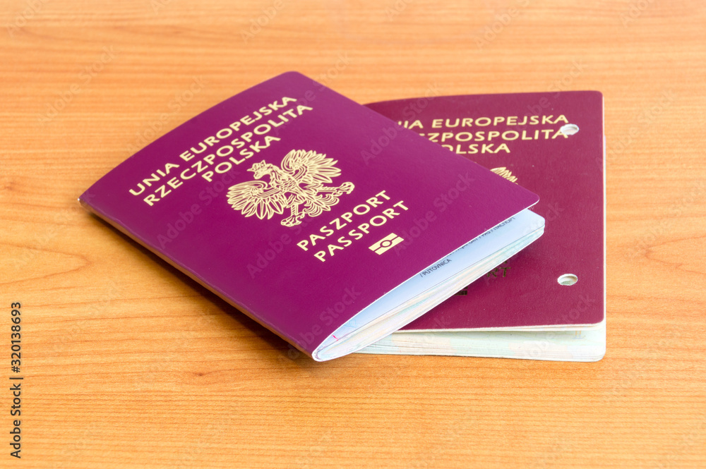 New and canceled Polish biometric passport with holes on the side. New and canceled Polish biometric passport with holes on the side.