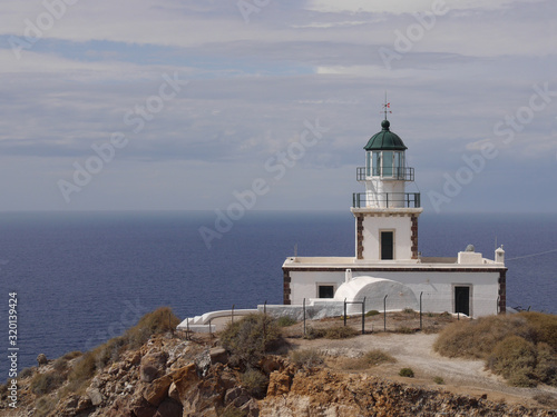 Akrotiri Lighthouse on the Greek island of Santorini © Mizikevitch