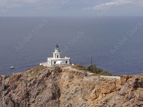 Akrotiri Lighthouse on the Greek island of Santorini © Mizikevitch