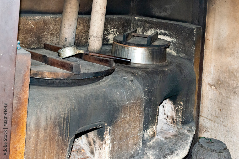 Traditional and old-fashioned wood-burning cooking stove in Japan Traditional and old-fashioned wood-burning cooking stove in Japan
