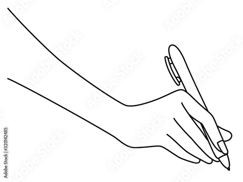 ボールペンを持つ女性の手元