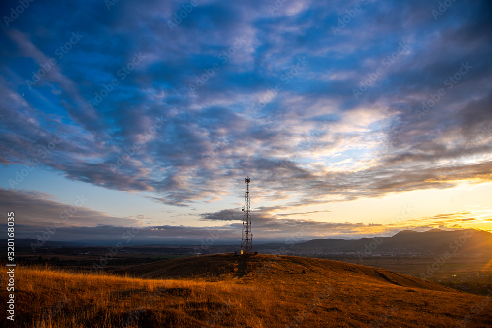 Obraz premium Landscape on the hill at the sunset