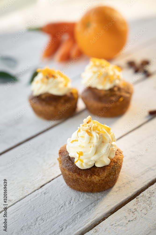 carrot cake cupcake bite size dessert snack homemade baked dessert cream orange peel decoration board composition cafe bistro