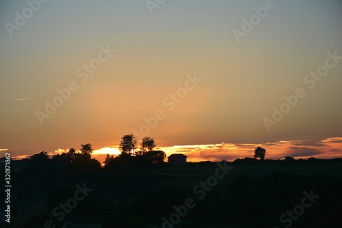 sunset over landscape and sky