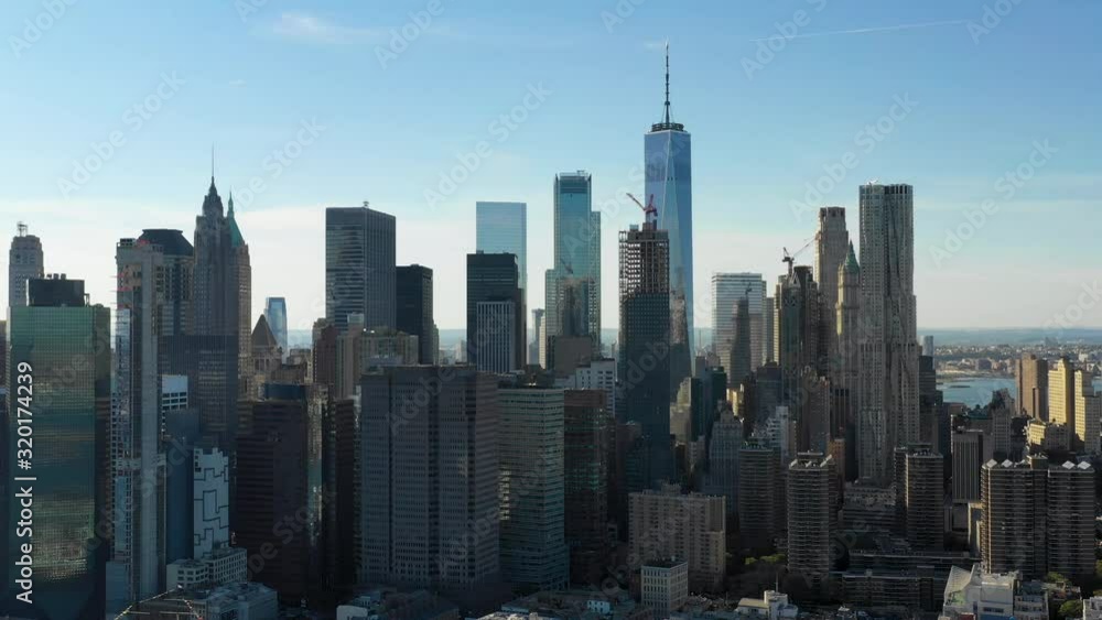 Aerial shot of the Wall street, lower Manhattan above East River in New York, USA Aerial shot of the Wall street, lower Manhattan above East River in New York, USA
