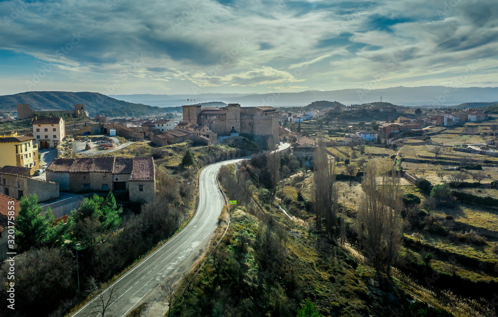 View of the road leading to Mora de Rubielos castle in Teruel province Spain