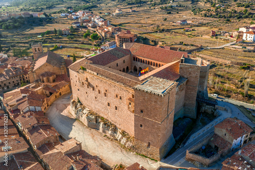 Aerial view of Mora de Rubielos town with medieval Gothic castle and city walls in Teruel Spain photo