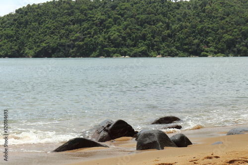 Paraty/Rio de Janeiro/Brazil - 01-18-2020 - Prainha beach near Paraty. Soft waves comes to coast. It's a good place to relax, to rest and have fun with family and friends. South America Beach