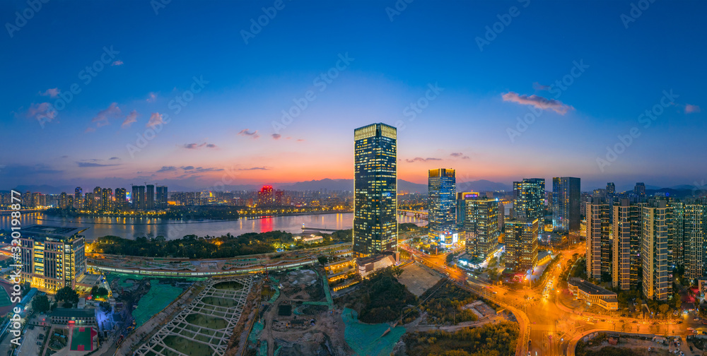 Obraz premium Night view of CBD on the North Bank of Min River, Fujian Province, China