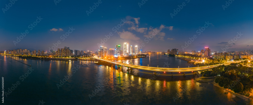 Night view of CBD on the North Bank of Min River, Fujian Province, China