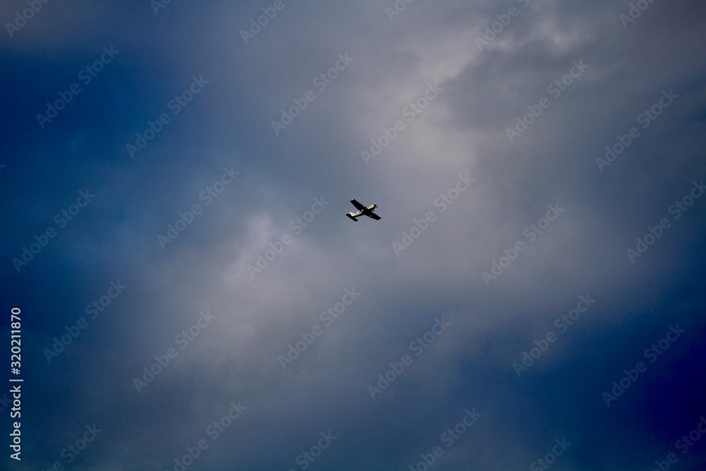 Plane flying in stormy weather