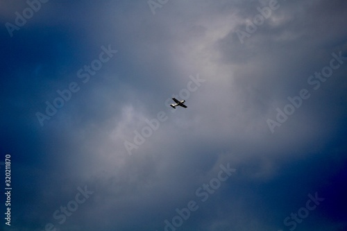 Plane flying in stormy weather