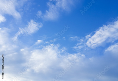 White scattered cloud and blue sky