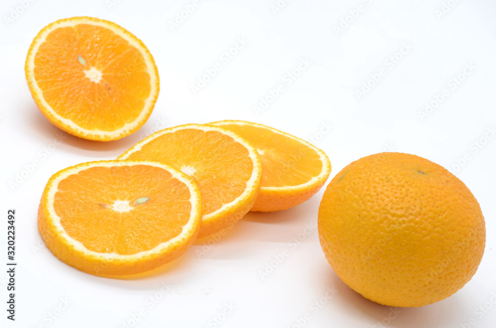 Fototapeta premium Orange slices on a white background