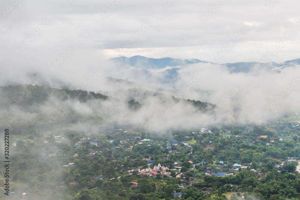 Fototapeta premium Tha-ton Chiang Mai Thailand village covered by the cloud mist on the morning