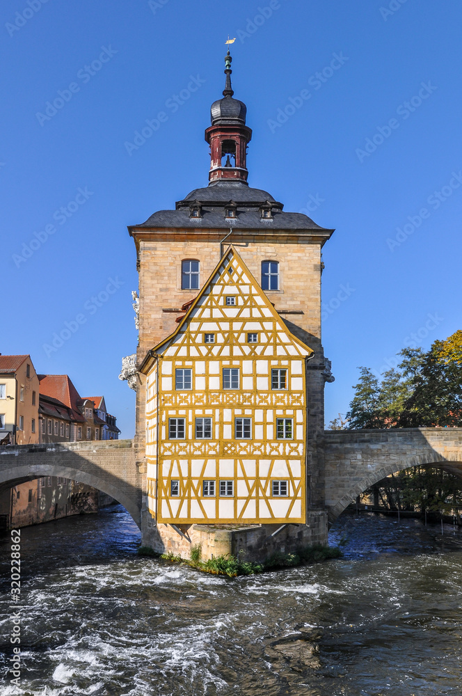 half-timbered old town hall of Bamberg located on a small island of the river Regnitz