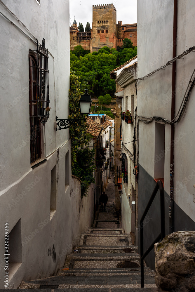 details of street in albaicin, granada, view of a narrow street in albaicin, the arab quarter in granada. spain