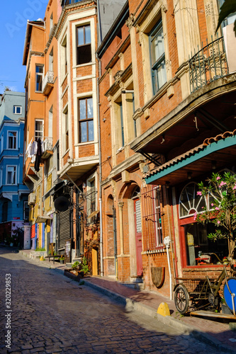 Fototapeta Naklejka Na Ścianę i Meble -  Istanbul, Turkey. July 21, 2019. Fatih historic district, Balat quarter, view of the street and houses